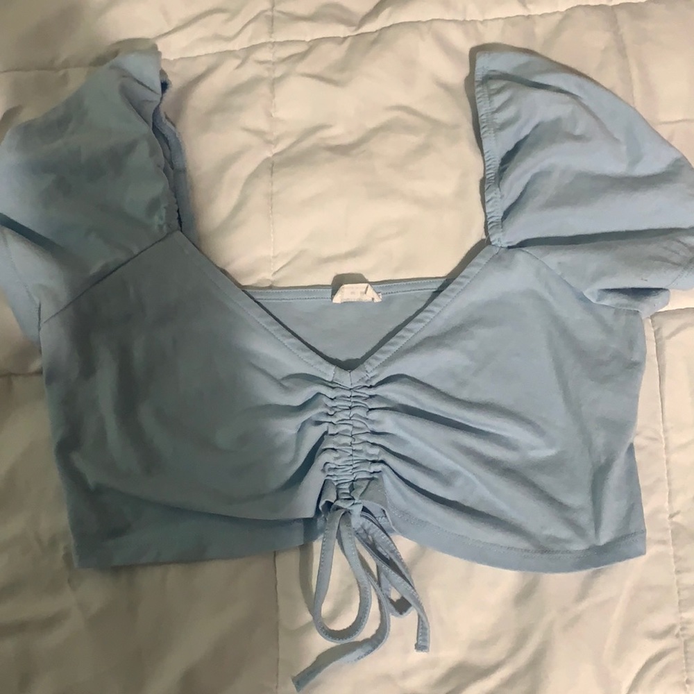 Baby blue crop top in the size medium super cute